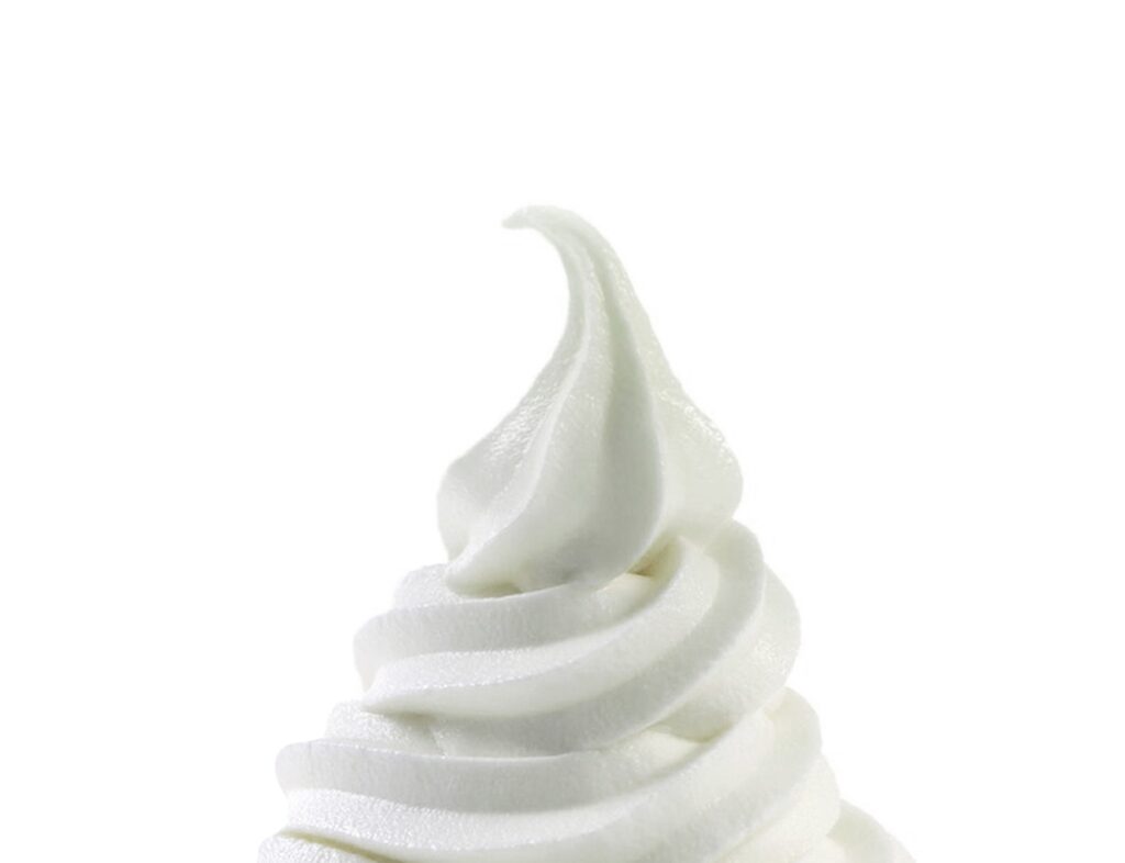 Vanilla soft ice cream on white